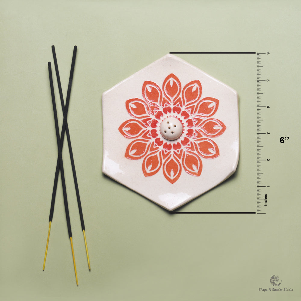 Handmade Ceramic Incense Stick Holder – Hexagonal, White Base with Orange Mandala Pattern