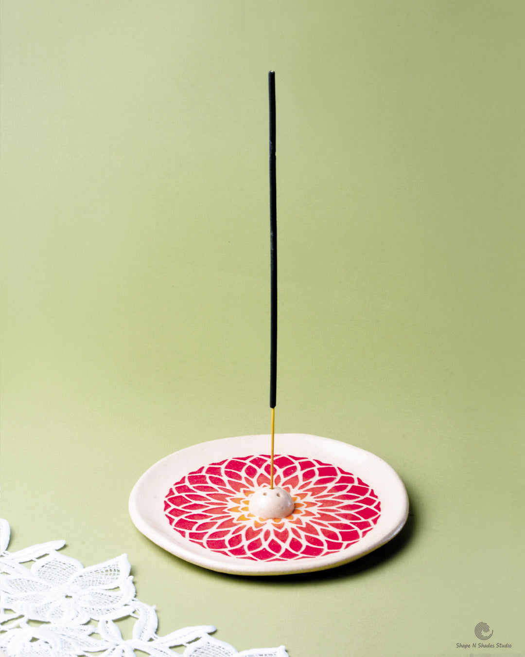 Handmade Ceramic Incense Stick Holder – Circle Shape, White Base with Red Gradation Mandala Pattern