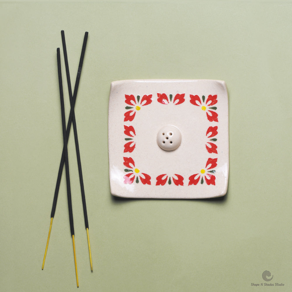Handmade Ceramic Incense Stick Holder – Square Shape, White Base with Floral Border Pattern