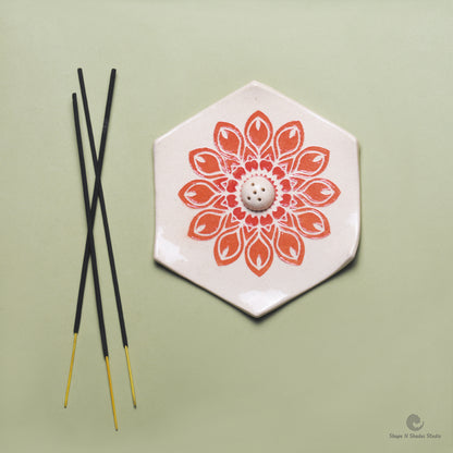 Handmade Ceramic Incense Stick Holder – Hexagonal, White Base with Orange Mandala Pattern