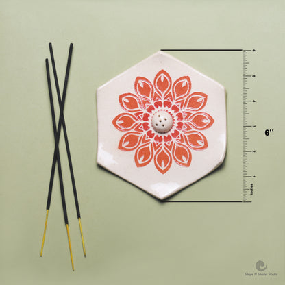 Handmade Ceramic Incense Stick Holder – Hexagonal, White Base with Orange Mandala Pattern